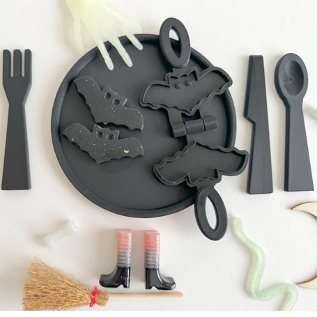 3D printed eco mold and press with a bat design perfect for halloween playdough play and early learning.