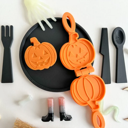 3D printed eco mold and press with a pumpkin design perfect for halloween playdough play and early learning.