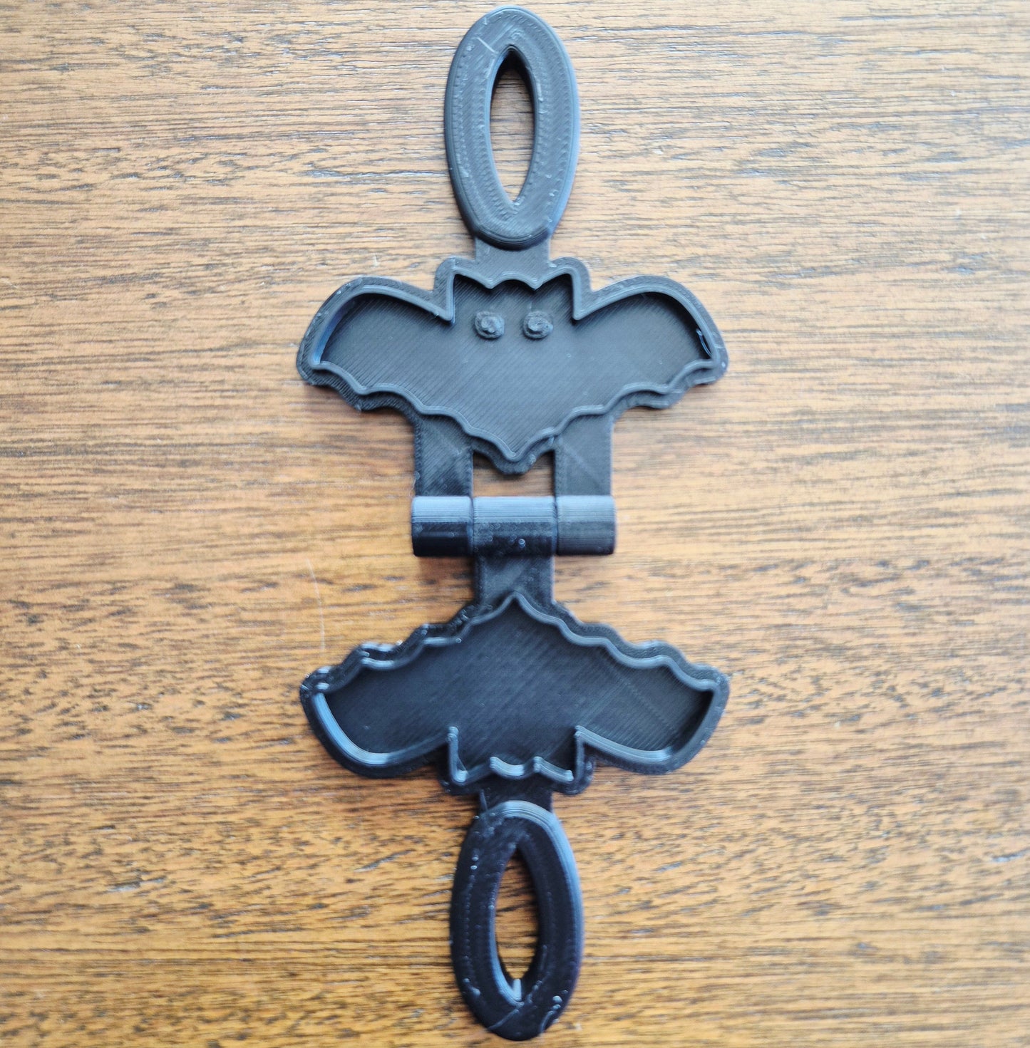 3D printed eco mold and press with a bat design perfect for halloween playdough play and early learning.