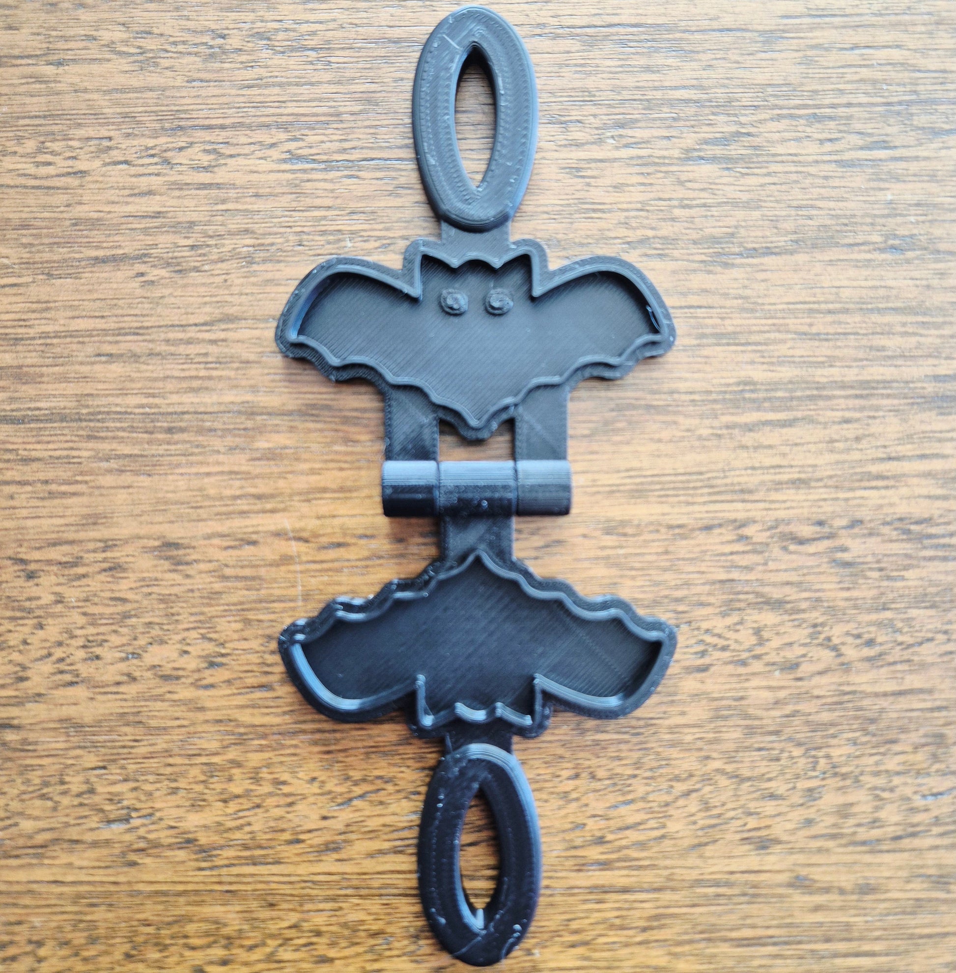 3D printed eco mold and press with a bat design perfect for halloween playdough play and early learning.
