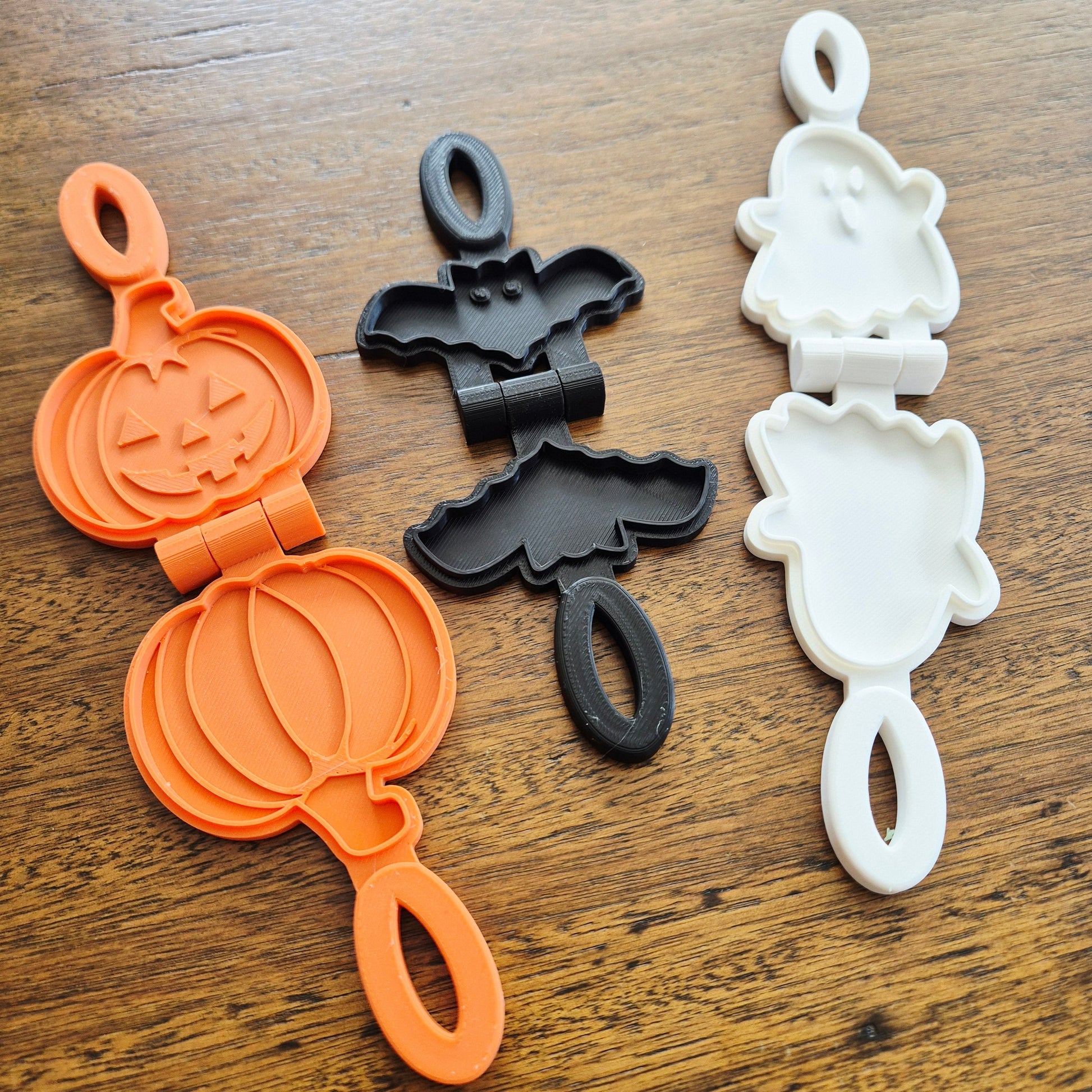 3D printed eco mold and press with a pumpkin design, bat design and ghost design perfect for halloween playdough play and early learning.