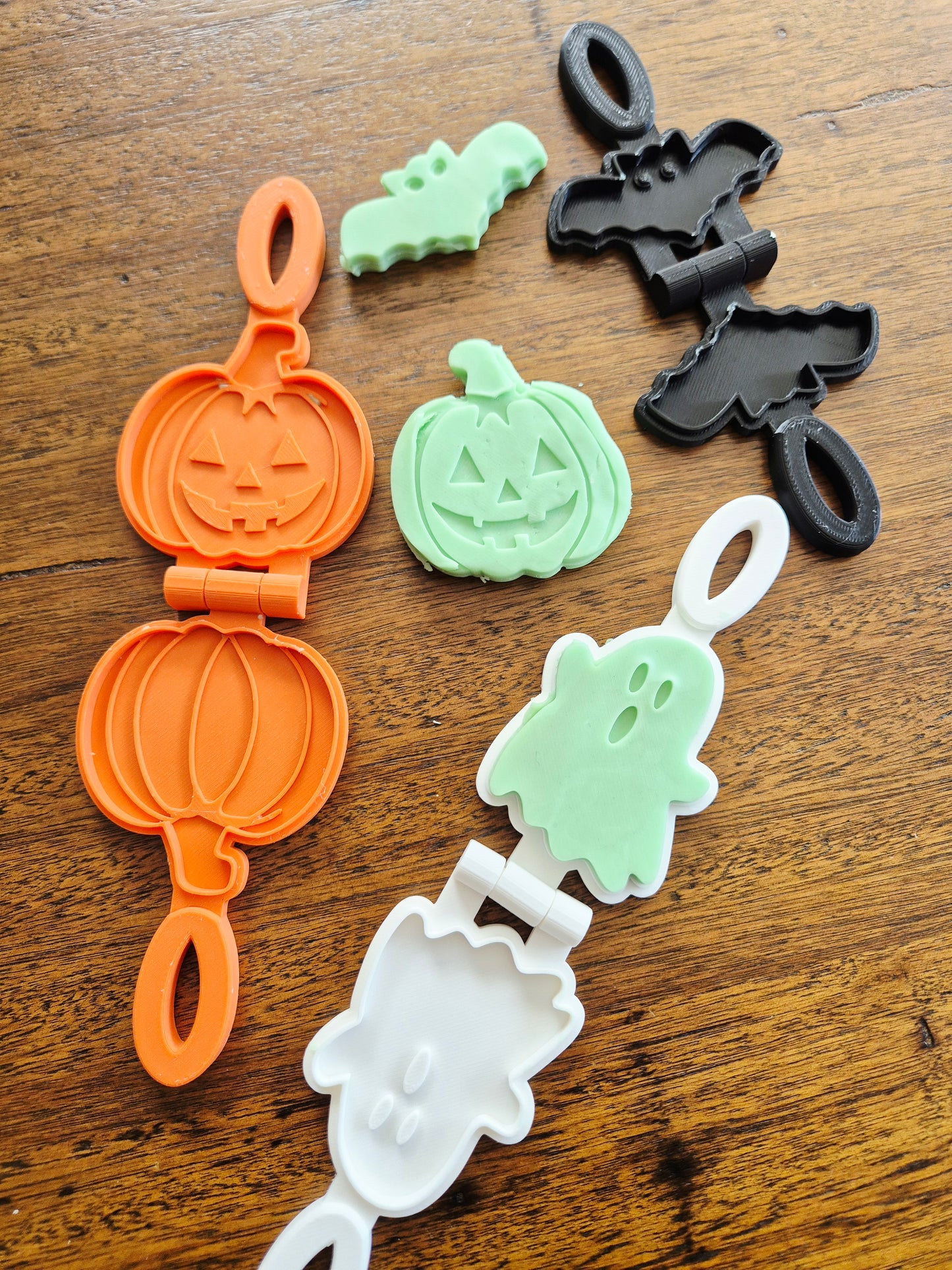 3D printed eco mold and press with a pumpkin design, bat design and ghost design perfect for halloween playdough play and early learning.