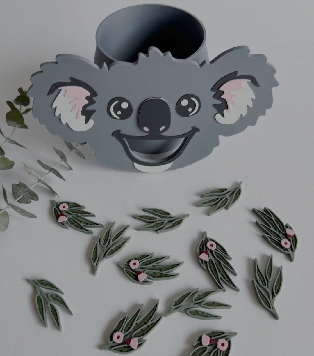 Feed the Koala sensory play tube with 15pcs Eucalyptus Leaves