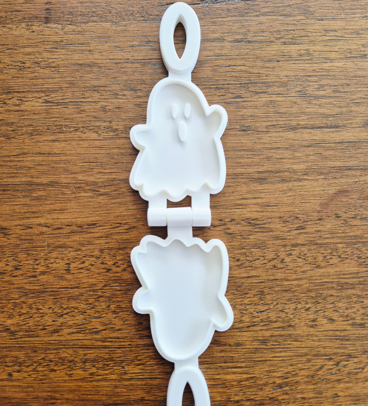 3D printed eco mold and press with a  ghost design perfect for halloween playdough play and early learning.